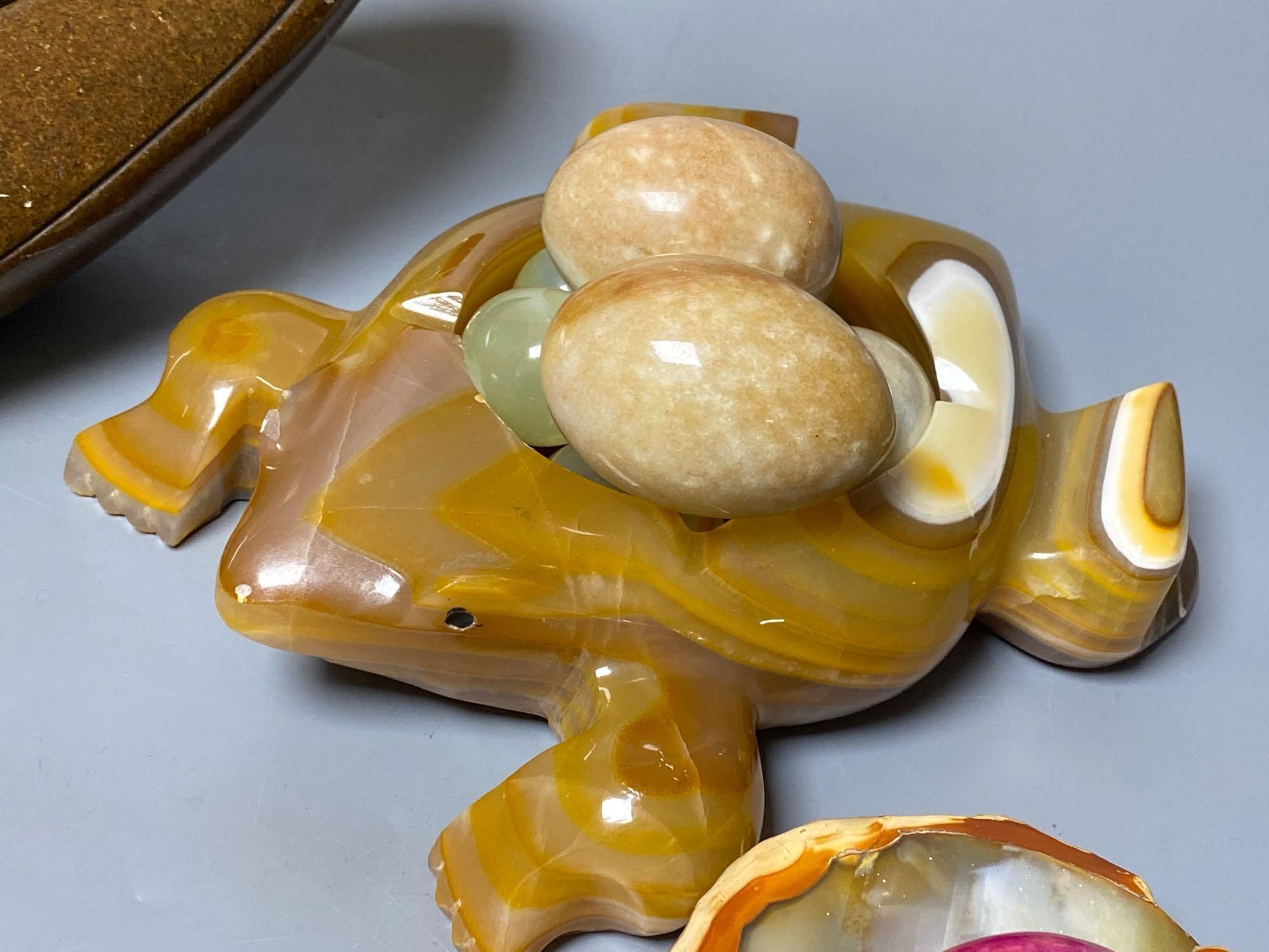 A Shona soapstone dish/duck containing eggs, a turquoise parrot on stand and various hardstone carvings and boxes